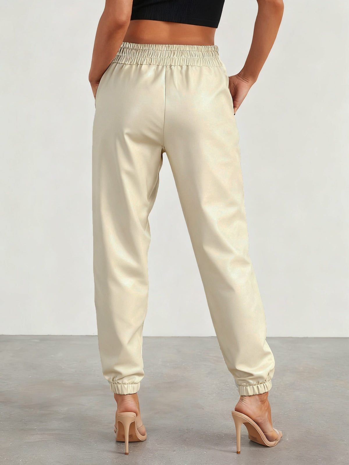 Tapered faux leather pants