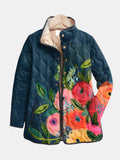 Navy floral print quilted jacket with snap buttons, front view