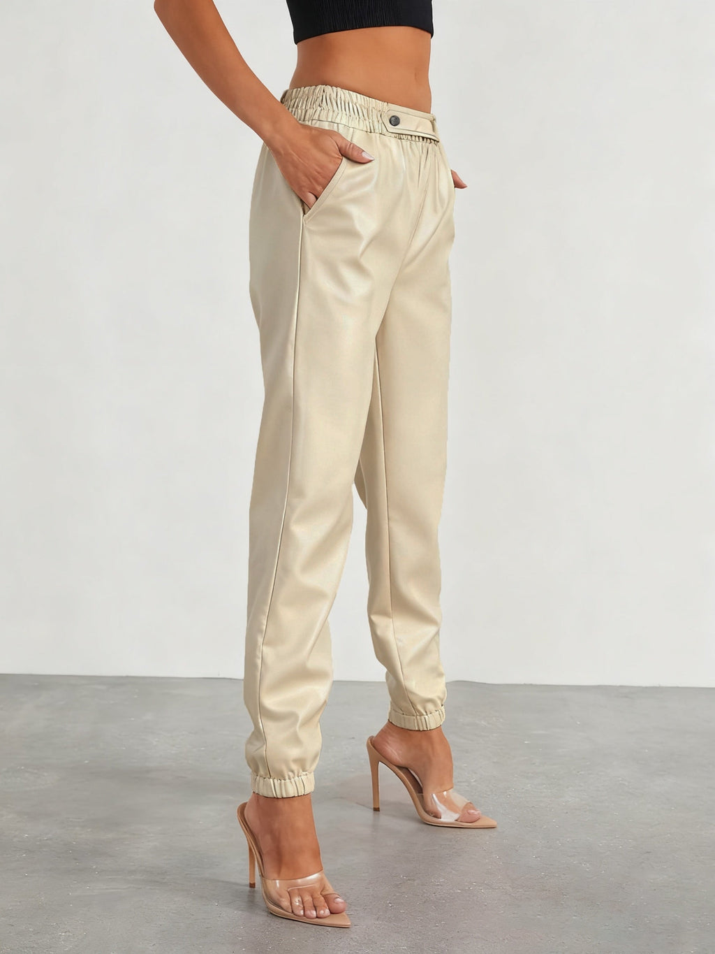 Tapered faux leather pants