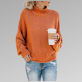 Orange chunky knit turtleneck sweater with drop shoulder sleeves, front view