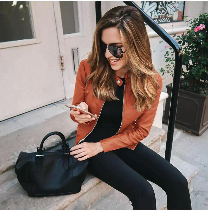 Black leather jacket with moto zip front and stand collar