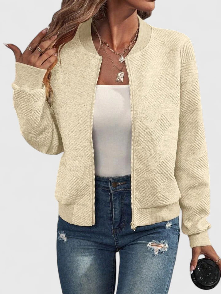 Beige textured knit bomber jacket with ribbed collar and cuffs