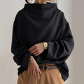 Black soft knit cowl neck sweater with balloon sleeves, front view