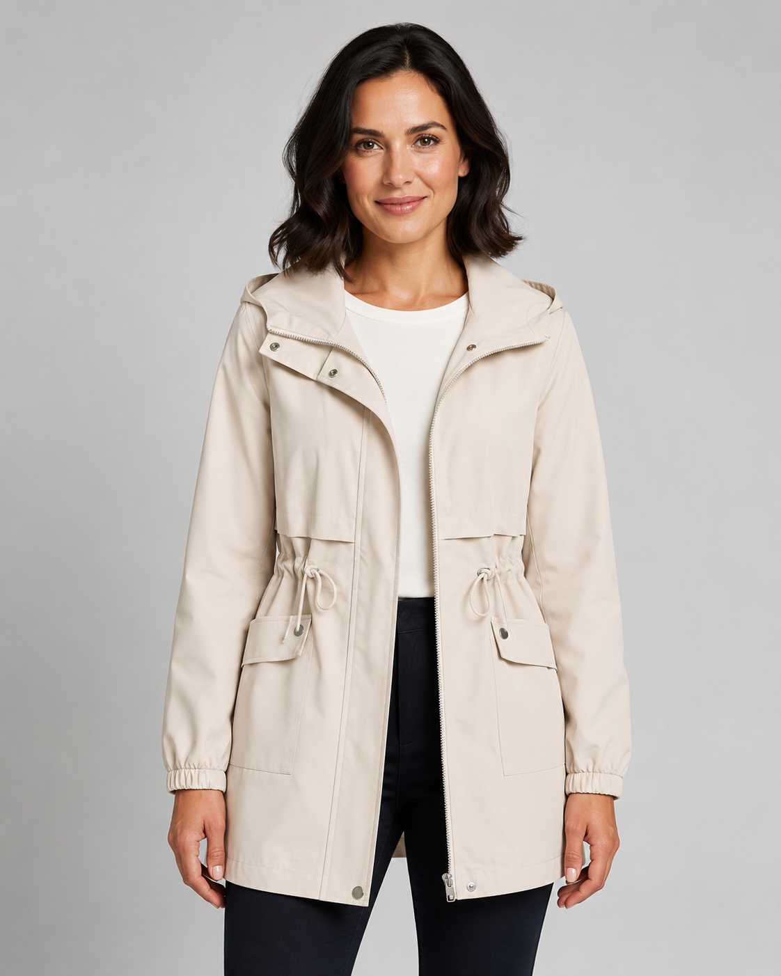 Beige hooded longline parka with drawstring waist, front view