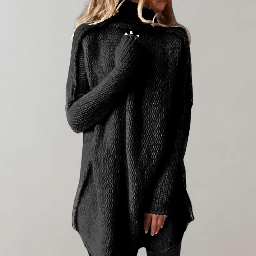 Black relaxed longline turtleneck sweater with side slits, front view