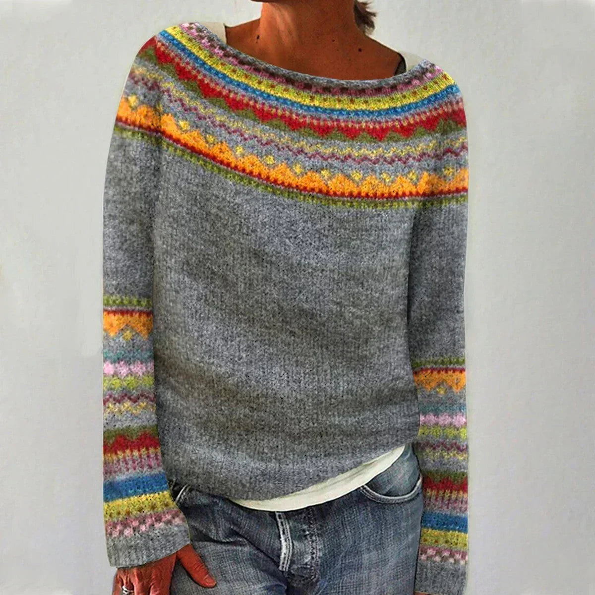 Gray boat neck knit sweater with colorful patterned yoke, front view