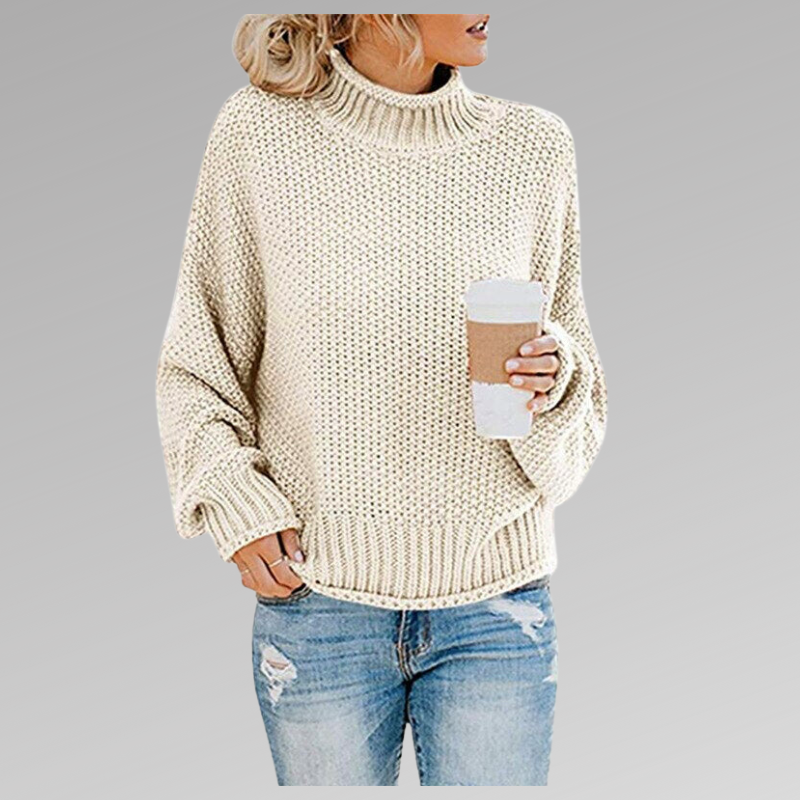 Cream chunky knit turtleneck sweater with drop shoulder sleeves
