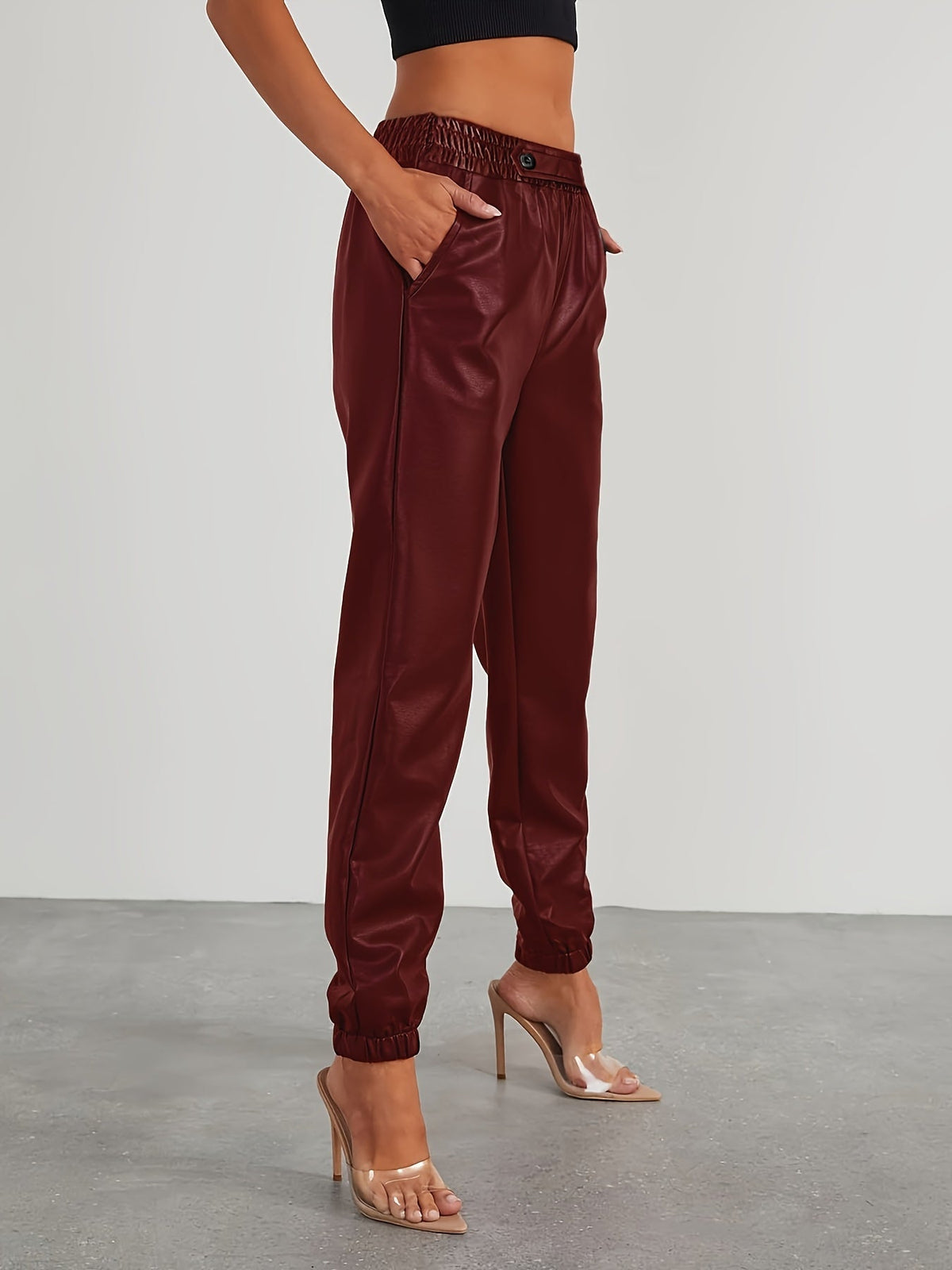 Tapered faux leather pants