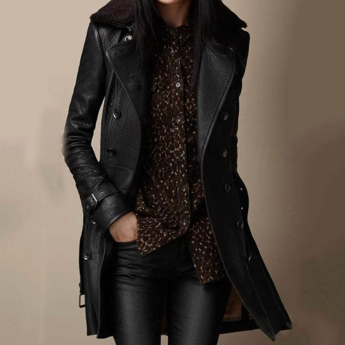 Black longline faux leather coat with shearling collar, front view